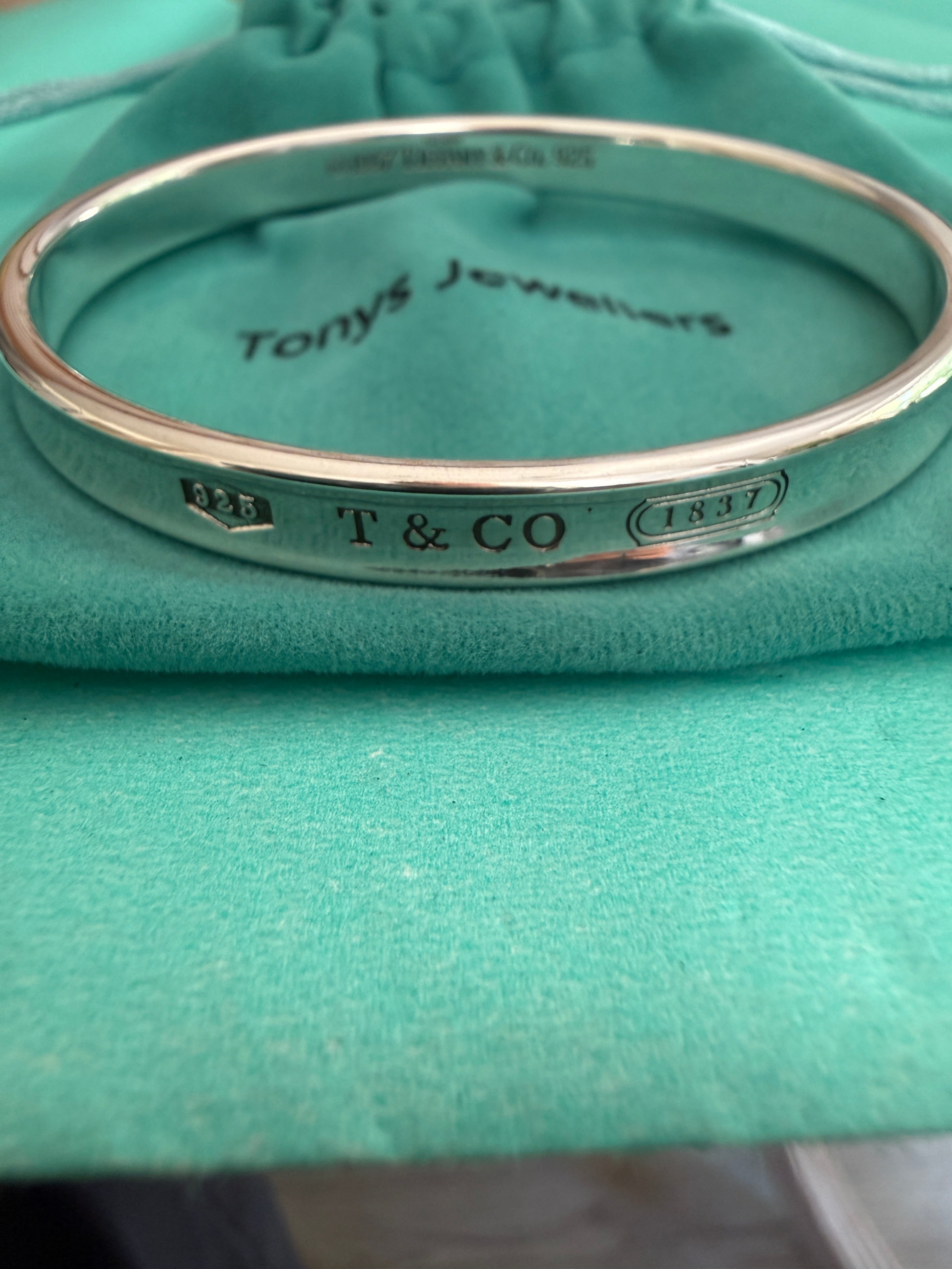 Tiffany & Co. Sterling Silver 1837 Oval Concave Bangle 18cm internal